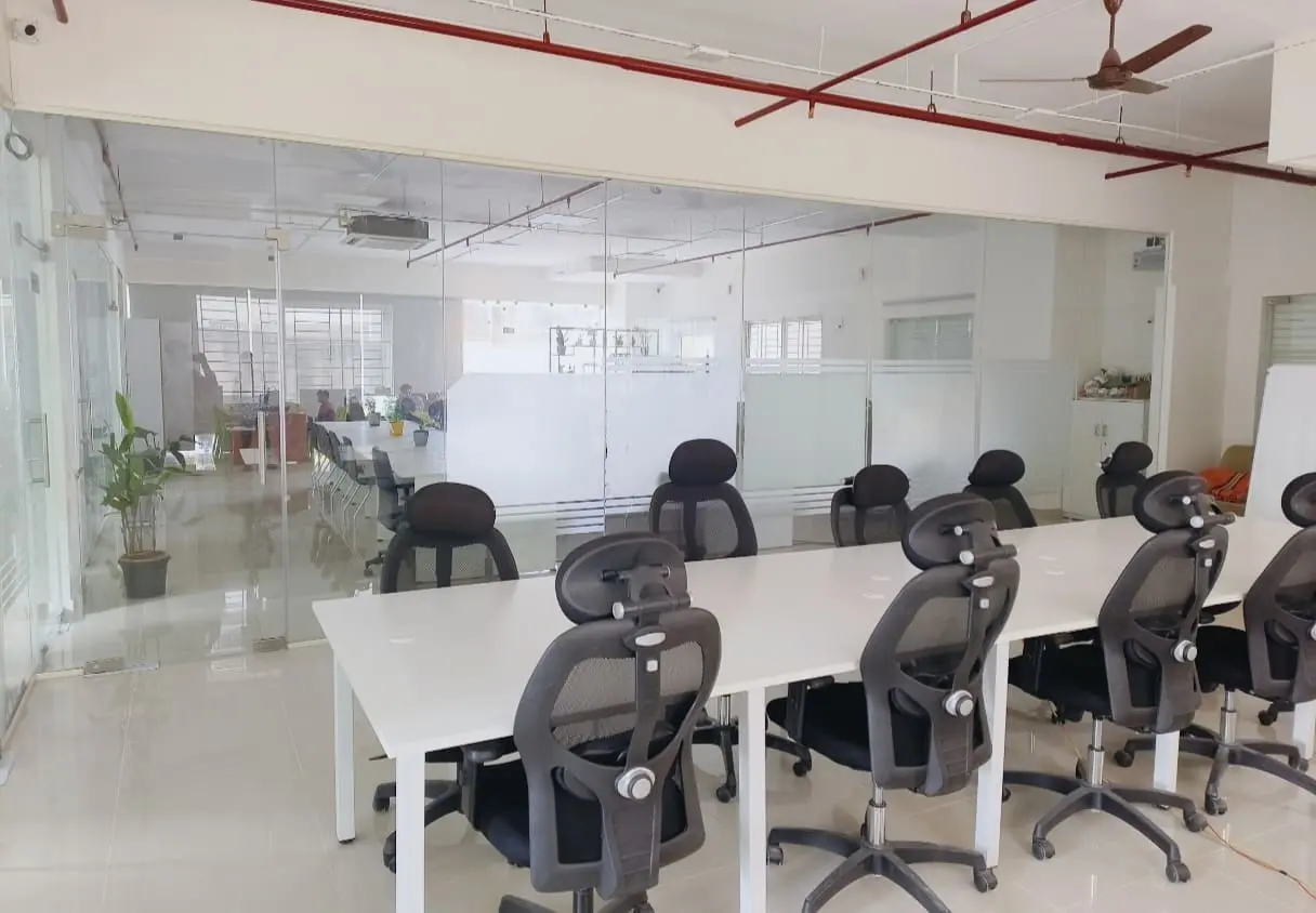 Floor to ceiling glass office cabin partition in Bangalore