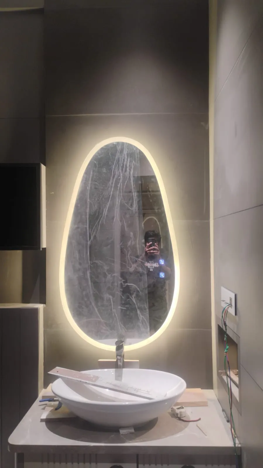 Oval LED backlit bathroom mirror with touch sensor in Bangalore